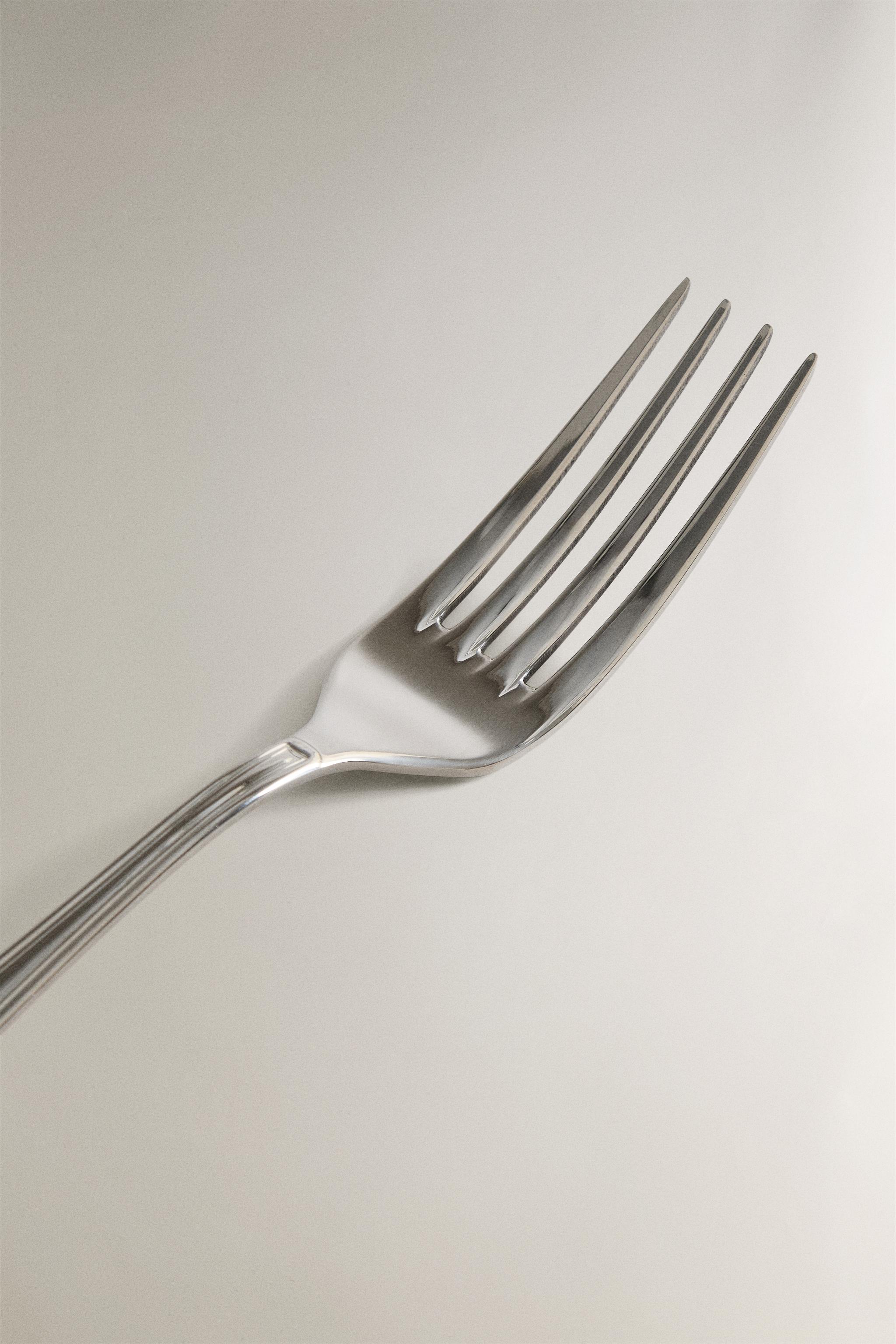 SHINY STEEL SERVING FORK